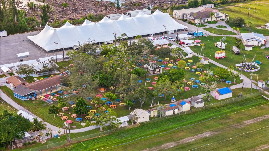 Panoramic festival tent on the event field by Creative Events & Rentals
